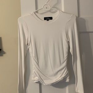 White long sleeve top with ruched sides, your best of LuLus!